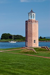 Sailboat Anchored by Avery Point Lighthouse in Connecticut